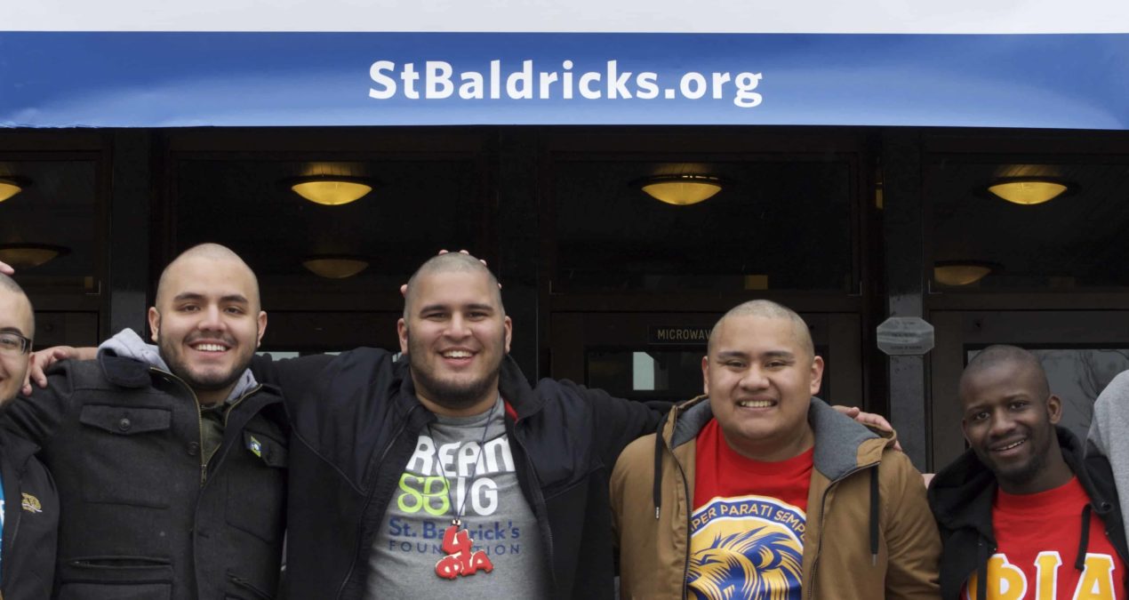 Students bravely shave heads for childhood cancer awareness