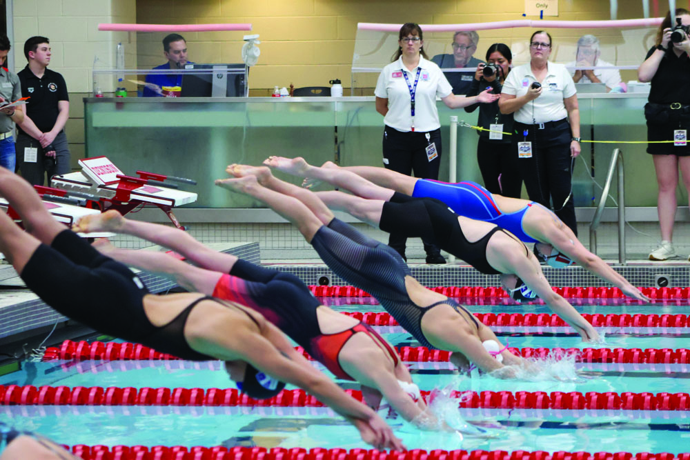 Men’s swim and dive win NCAC championship, women’s team finishes second